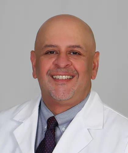 Dr. Navesh K Sharma